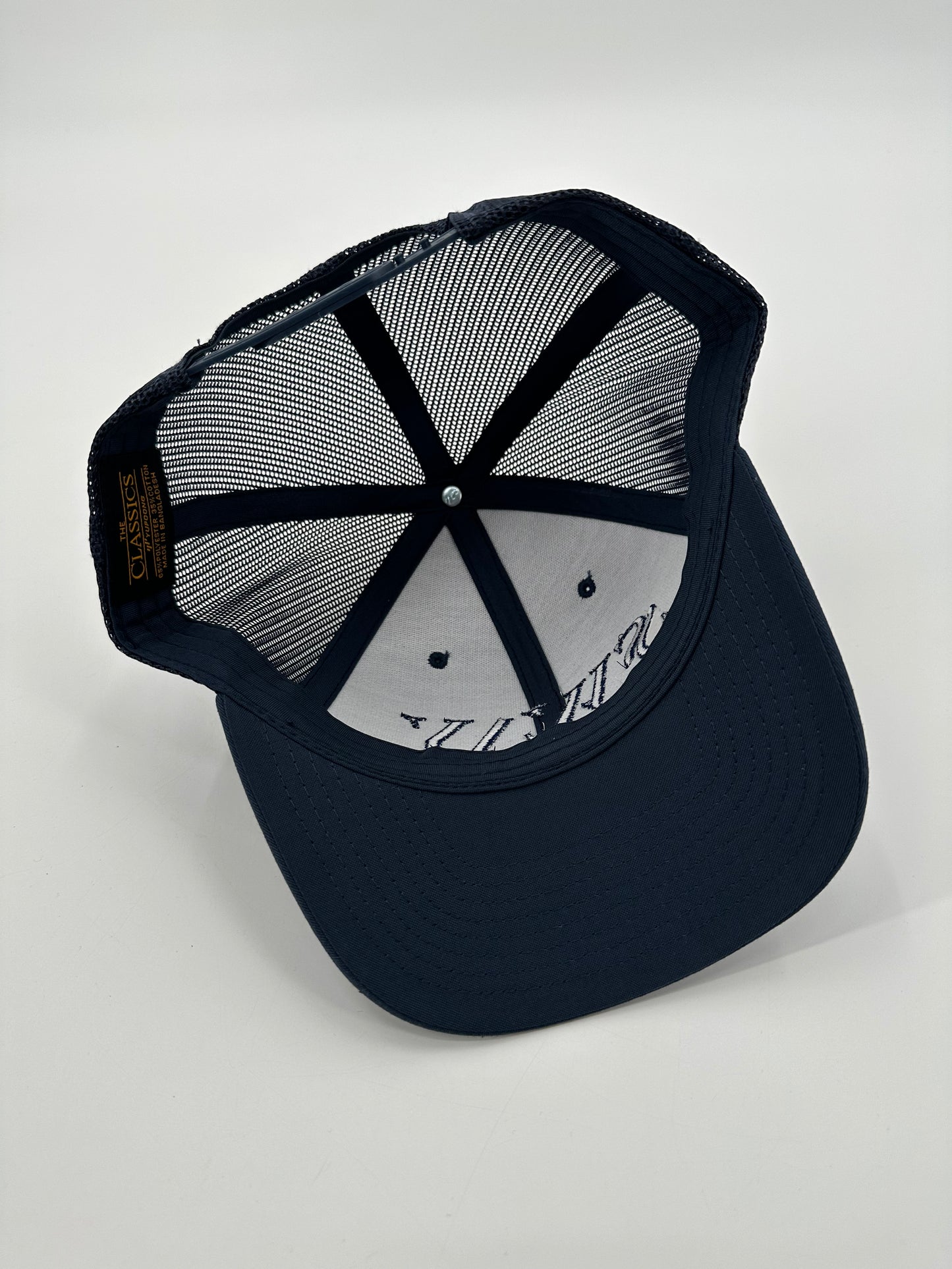 Navy on Navy Trucker Hat